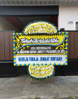 Papan Bunga Duka di Sinartanjung